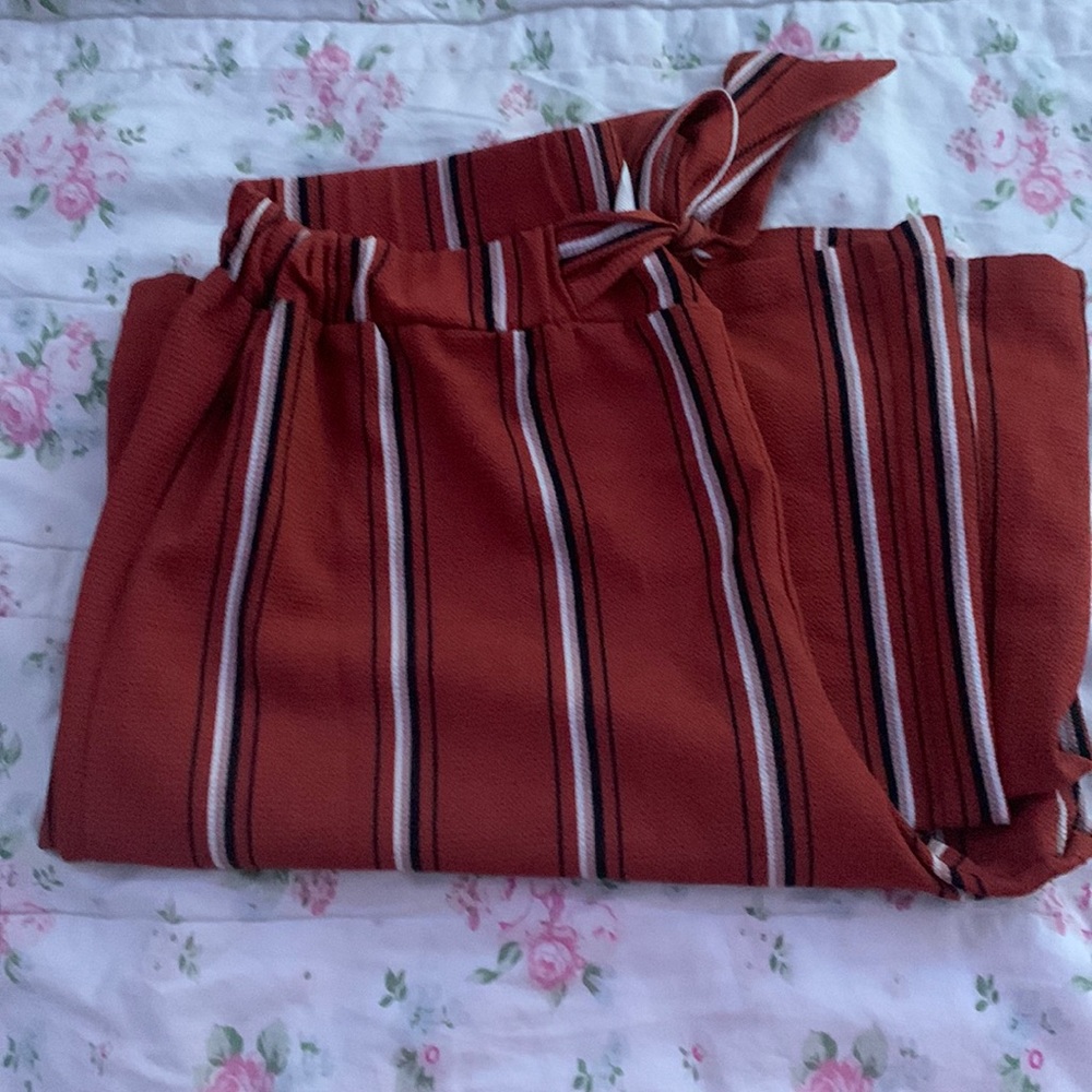 burnt orange is the color of these pants the tie loosens a lot too